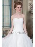 Robe de mariée avec des plissés