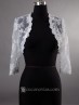 Chaqueta con encaje y pedreria para novia con adornados florales y manga francesa