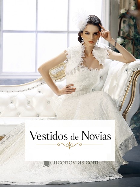 Vestido novia con plumas.