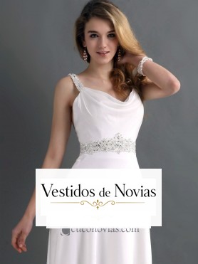Traje nupcial con escote con caida.