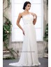 Vestido de novia con plisados.