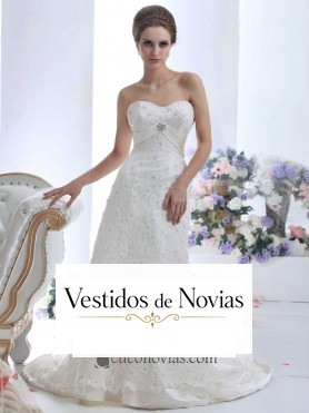 Vestido novia ornado con brillo y pedrería.
