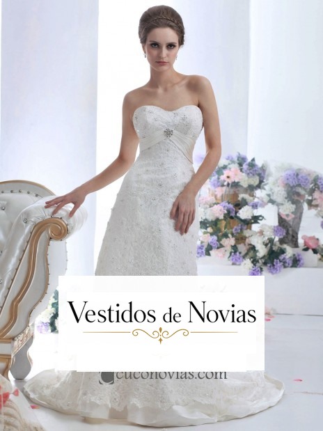 Vestido novia ornado con brillo y pedrería.