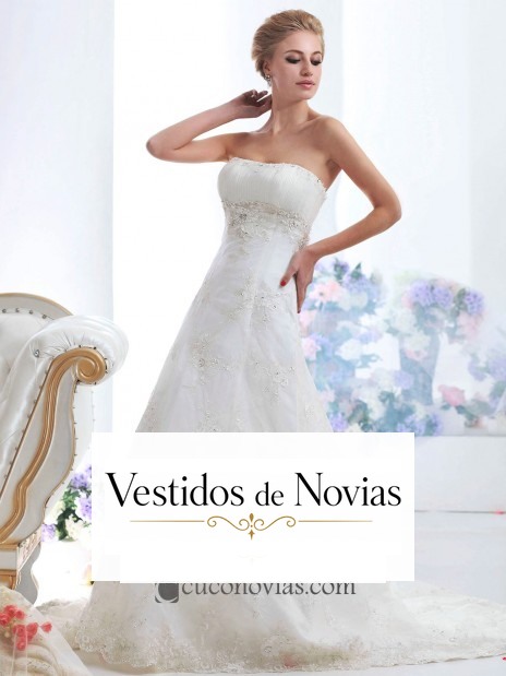 Traje de novia línea A con bordados.