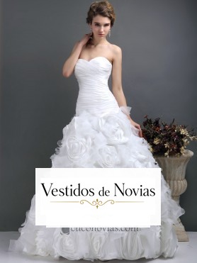 Traje de novia en organdí.