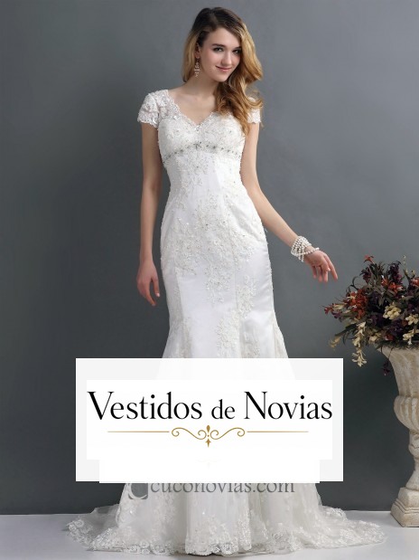 Vestido de novia mangas cortas.